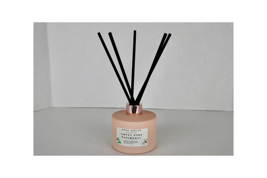 Sweet Pine Patchouli Reed Diffuser in a Scallop Shell Matte Bottle 4 oz